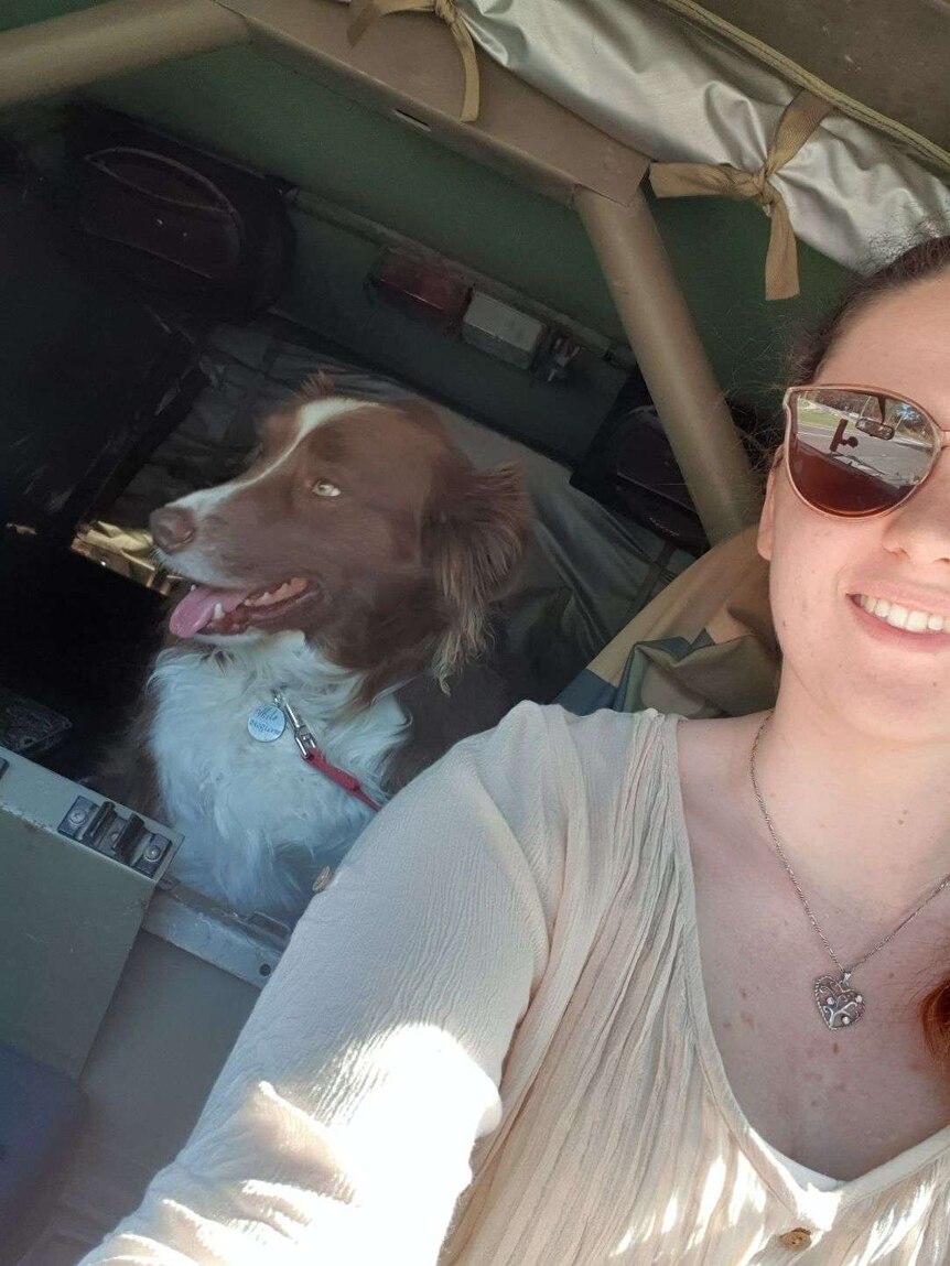 A selfie shows Brooke with Milo, a brown border collie.