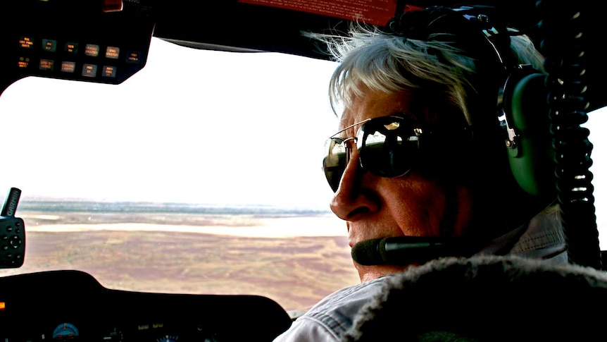 Gary Ticehurst flies the ABC helicopter in May 2010.