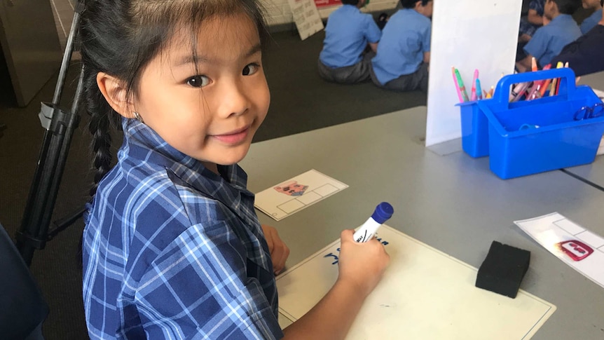 A young pupil at Our Lady of the Rosary Catholic Primary School