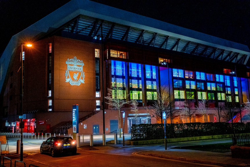 Liverpool Anfield stdium glows in yellow and blue for Ukraine