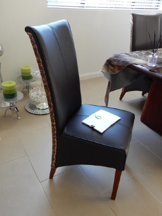 A black dining chair
