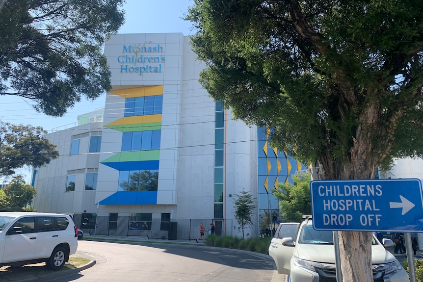 The outside of the Monash Children's Hospital, a multi-storey building, on a sunny day.