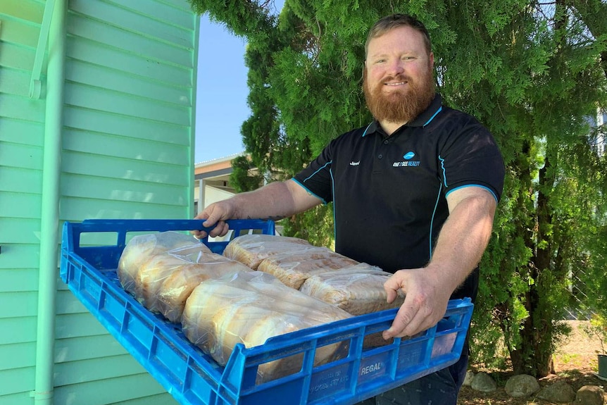 Jared Pennell delivers bread to homes.