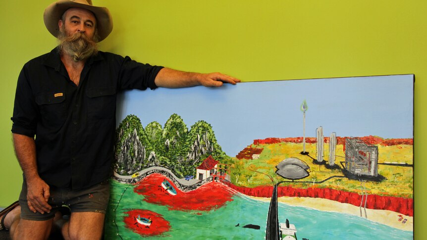 Adrian Dwyer with his painting