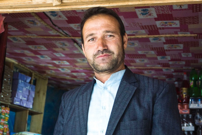 An Afghani man in a suit