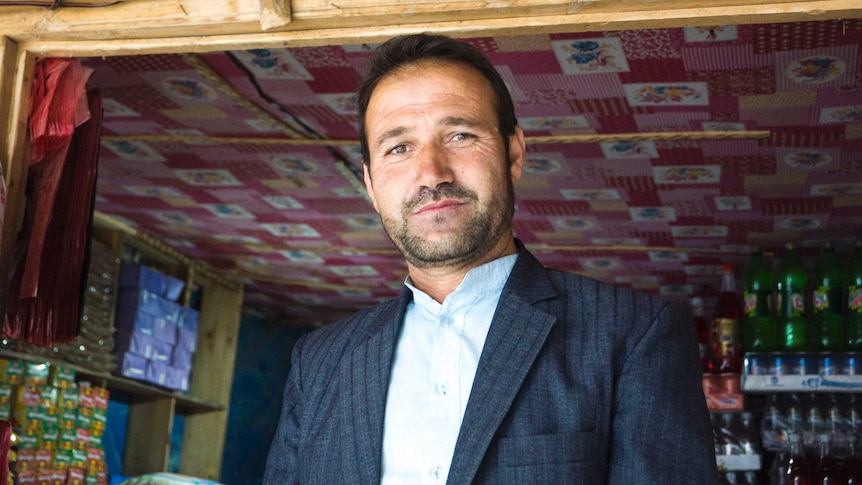 An Afghani man in a suit