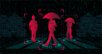 An illustration shows a pedestrian crossing with three people walking across it. Two are holding umbrellas.