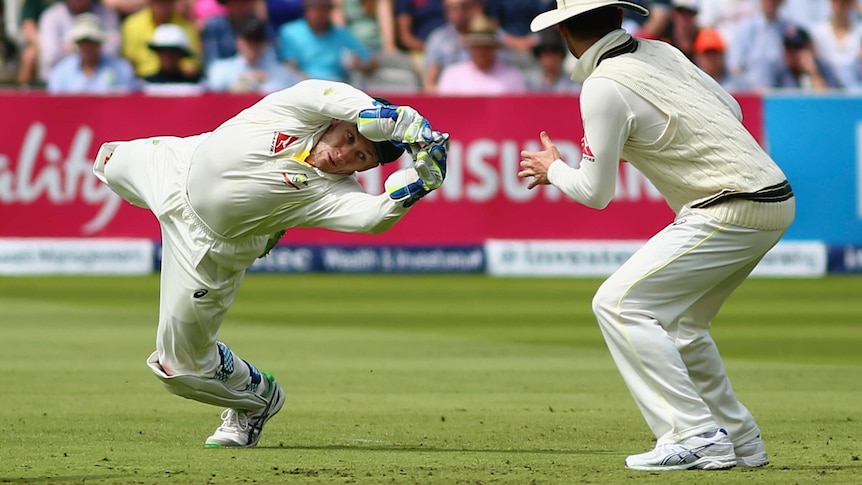 Peter Nevill dives for a ball during the Ashes
