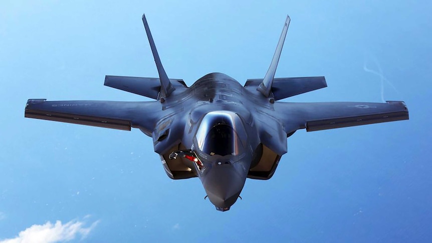 A F-35B joint strike fighter in flight is seen from above
