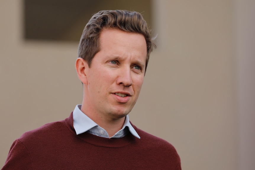 A closeup of Greens party member Max Chandler-Mather at a press conference. 