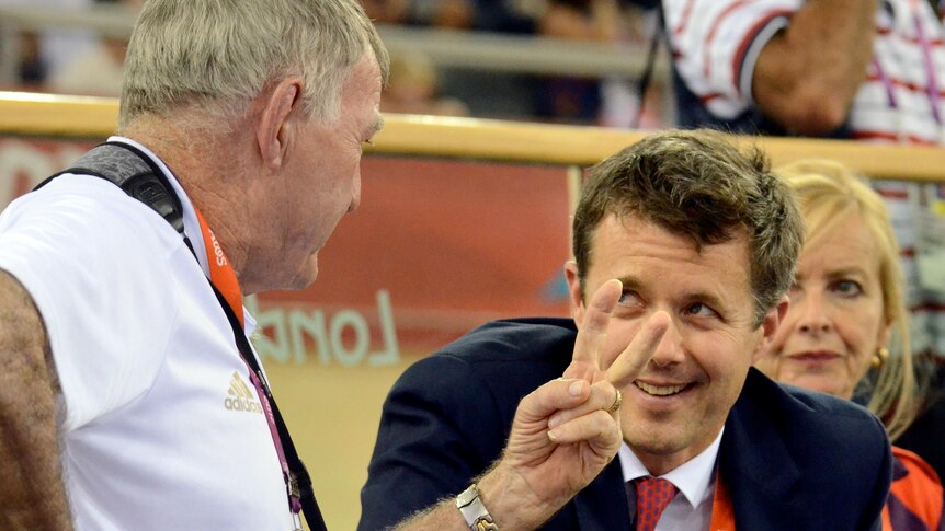 Laurie Lawrence speaks with Denmark's Crown Prince Frederik at the London velodrome.