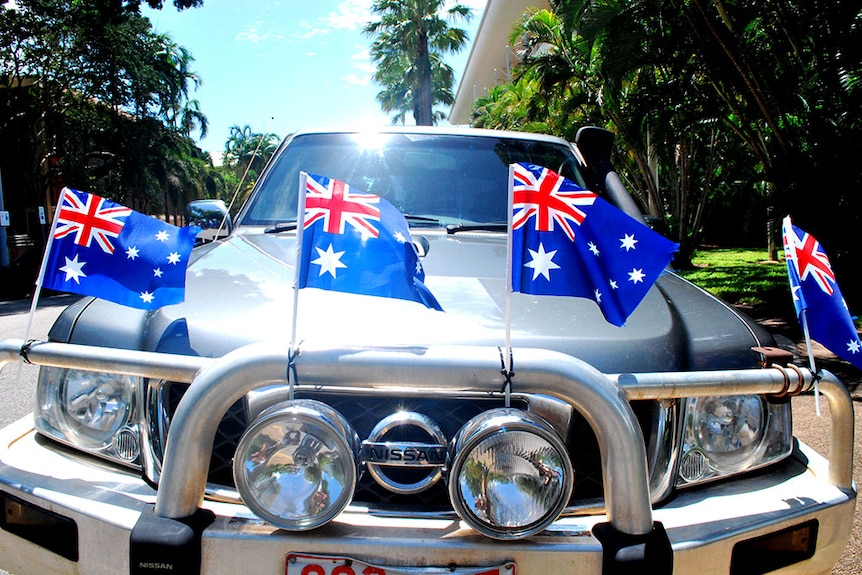 Flags on a car near Parliament House in Darwin