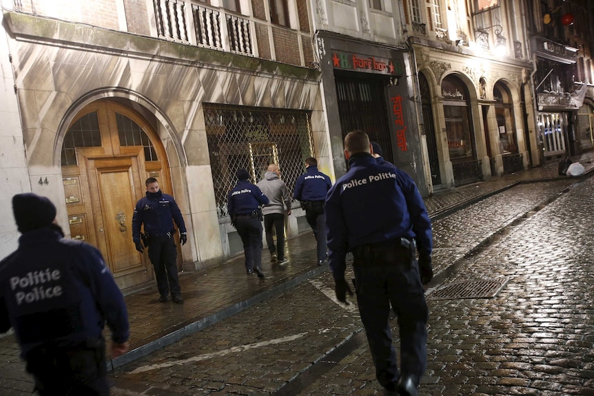 Belgian police arrest a man after security lockdown