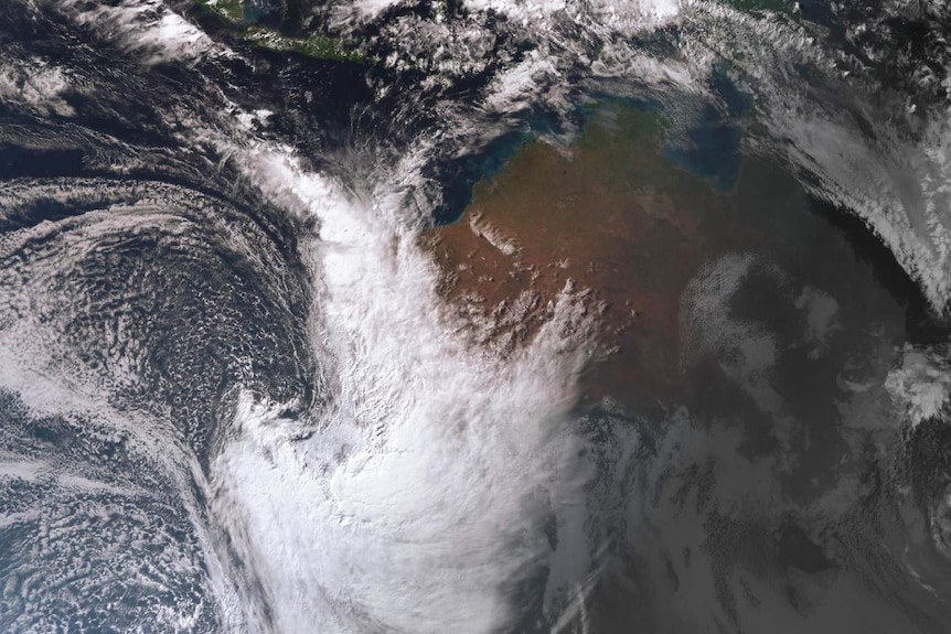 A satellite image of a storm front moving over WA