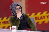 woman with glasses cries