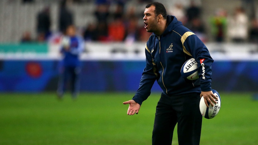 Wallabies coach Michael Cheika watches his side warm up before the Test against France