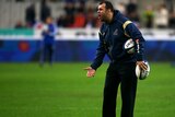 Wallabies coach Michael Cheika watches Australia warm up before the Test against France in Paris.