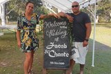 Chante and Jacob Ketu stand under their marquees set up on the Noosa North Shore a week before their wedding.
