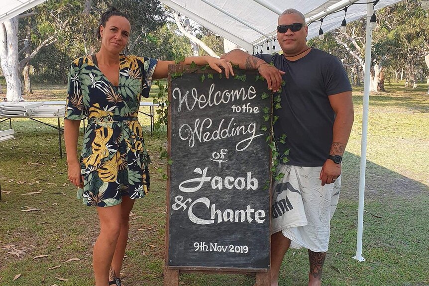 Chante and Jacob Ketu stand under their marquees set up on the Noosa North Shore a week before their wedding.