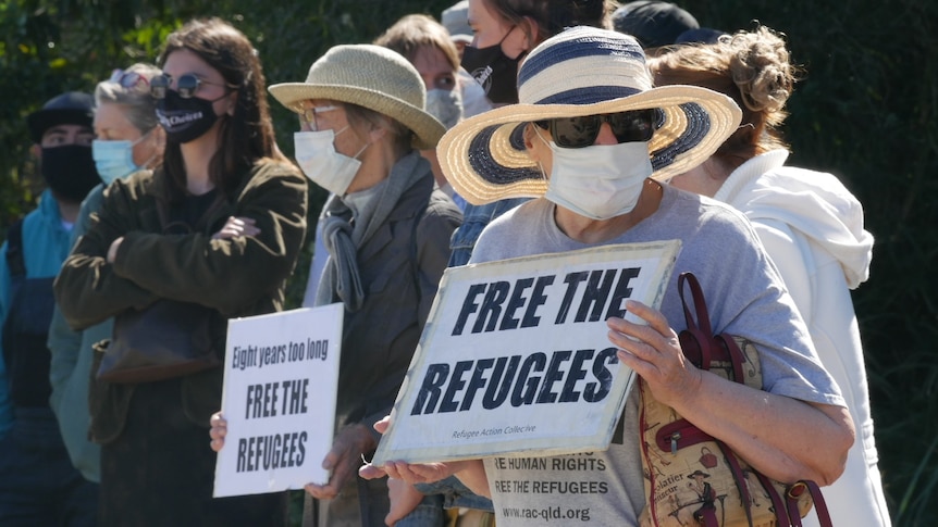 Refugee advocates protest outside Brisbane immigration centre to mark nine years of indefinite detention