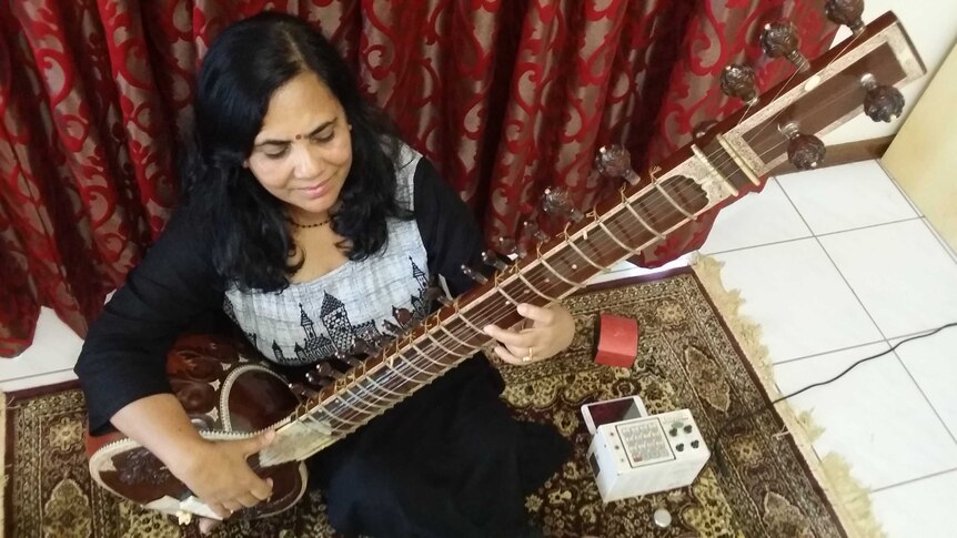 Darwin's Kabita Ghosh plays her sitar
