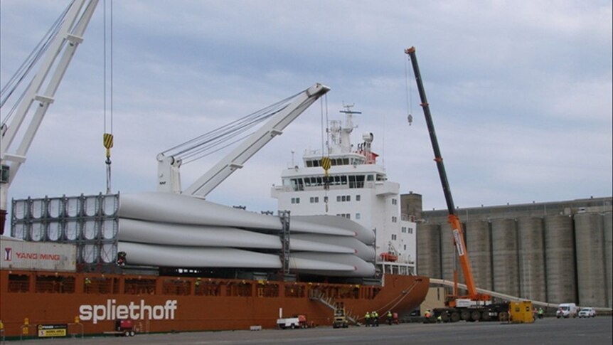 Wind turbines being unloaded from a ship at the Port of Portland