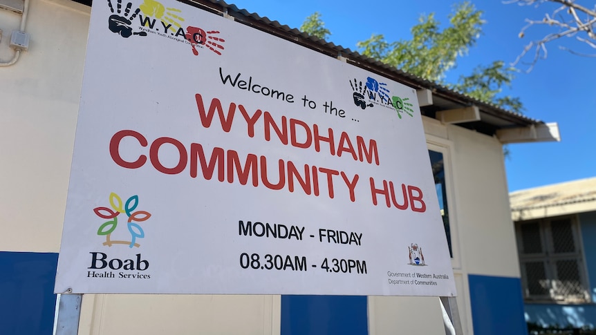 A sign that says Wyndham Community Hub and its opening hours
