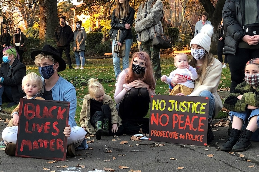 People at a protest rally.