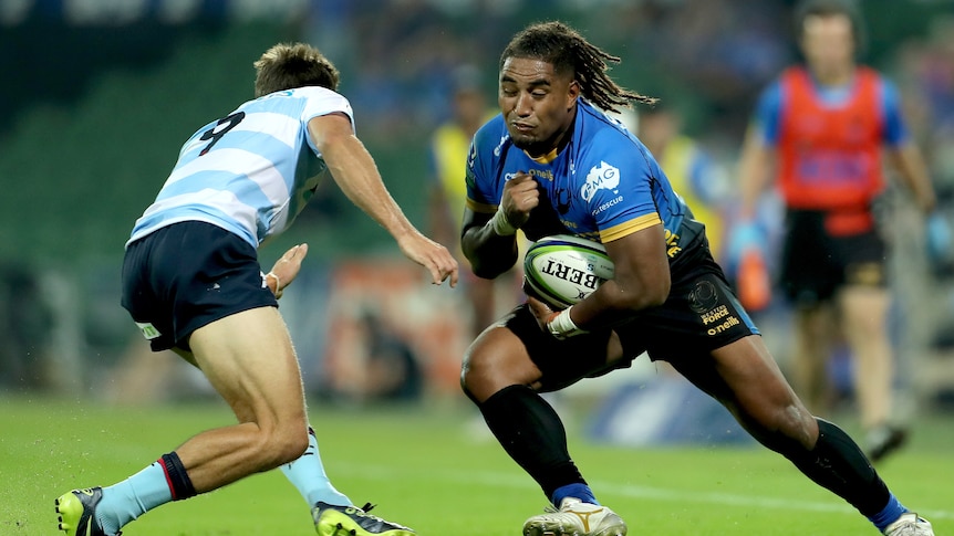 Jake Gordon of the Waratahs leans in to tackle Feleti Kaitu'u of the Force as Kaitu'u braces for the impact