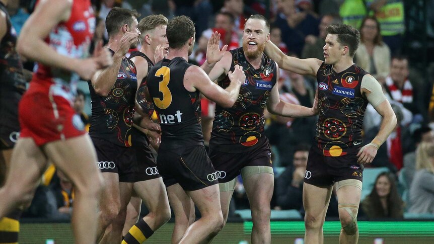 Hawthorn's Jarryd Roughead celebrates kicking the winner against the Sydney Swans.