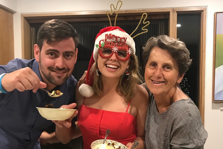 Grace Haslinghouse and her family posing at Christmastime.