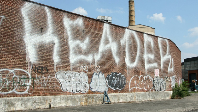 Graffiti tag painted using fire extinguisher