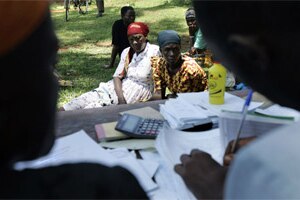 Women wait to get a microcredit loan in Kenya (AFP/Roberto Schmidt)
