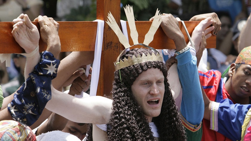 Stations of the cross: John Safran hangs on the cross in the Philippines.