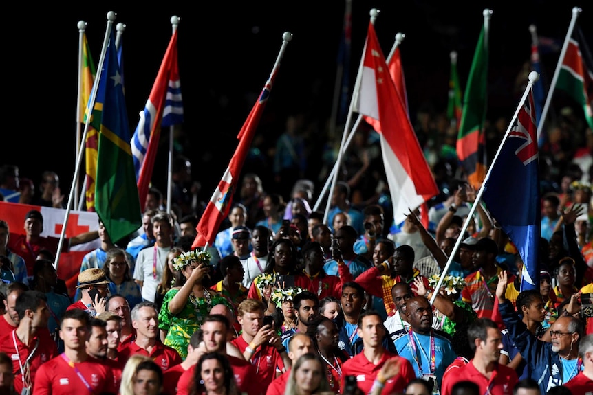 Athletes are seen before the start of the closing ceremony of the XXI Commonwealth Games on the Gold Coast.