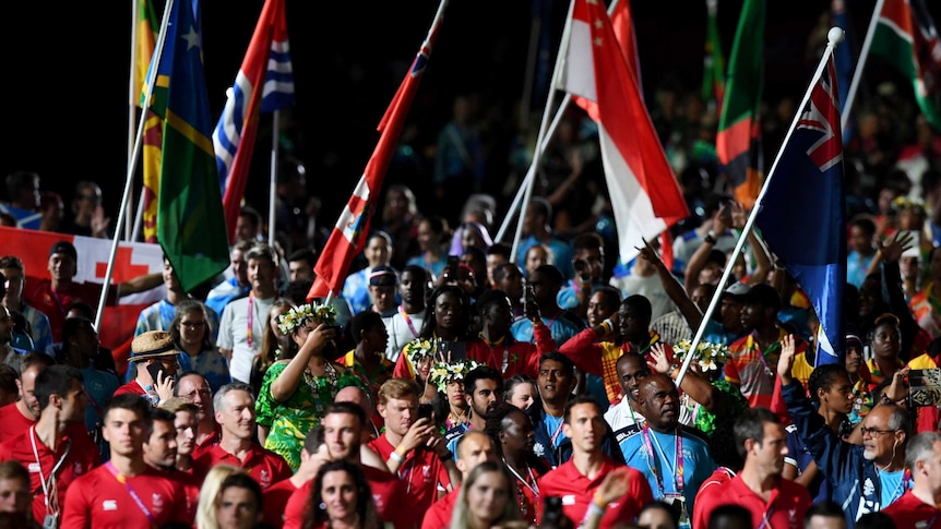 Athletes are seen before the start of the closing ceremony of the XXI Commonwealth Games on the Gold Coast.
