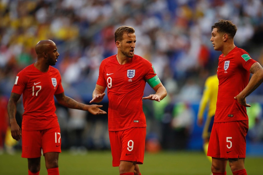 Harry Kane talks to teammates during World Cup quarter-final