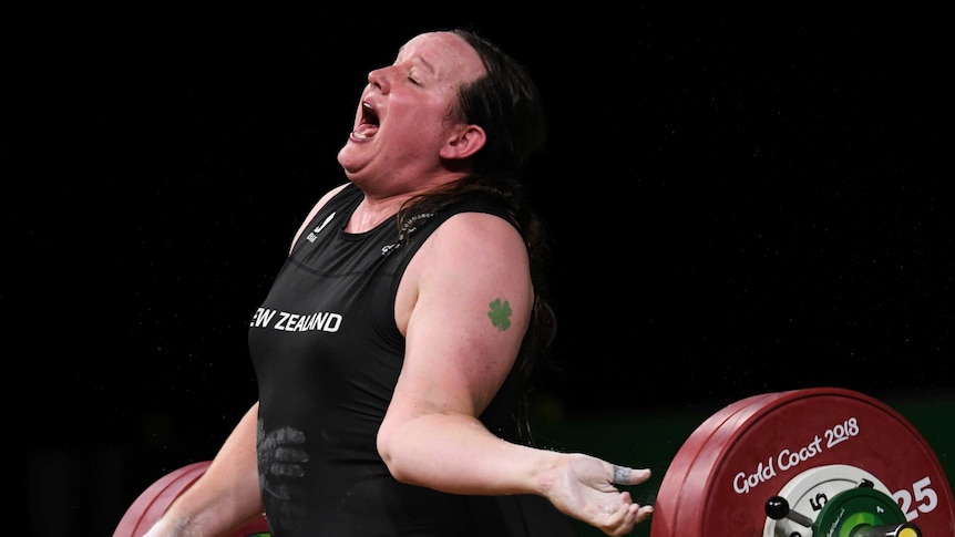 Laurel Hubbard's arm bends back during a lift.