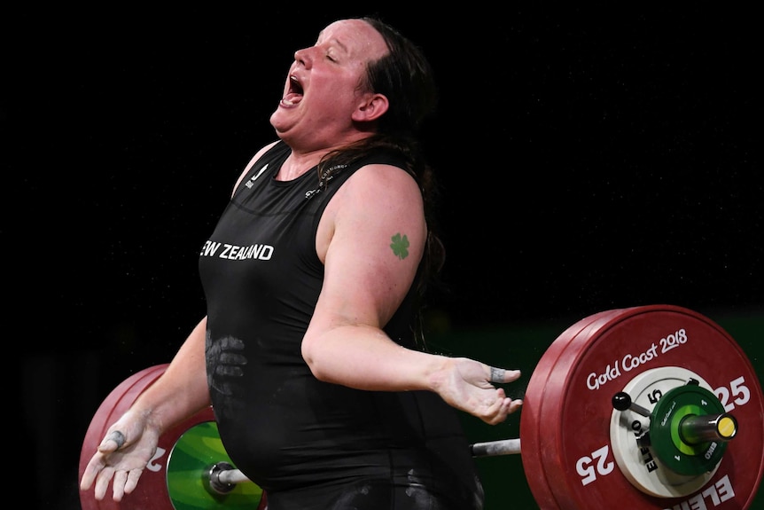 Laurel Hubbard's arm bends back during a lift.