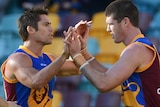 Simon Black and Jonathan Brown congratulate each other after a goal.