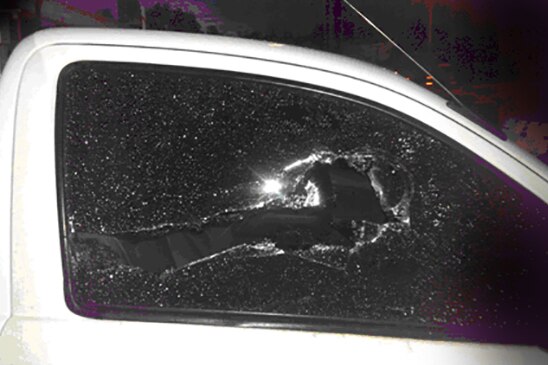 A man allegedly smashed this car window after going on a rampage with a chair and length of hose.