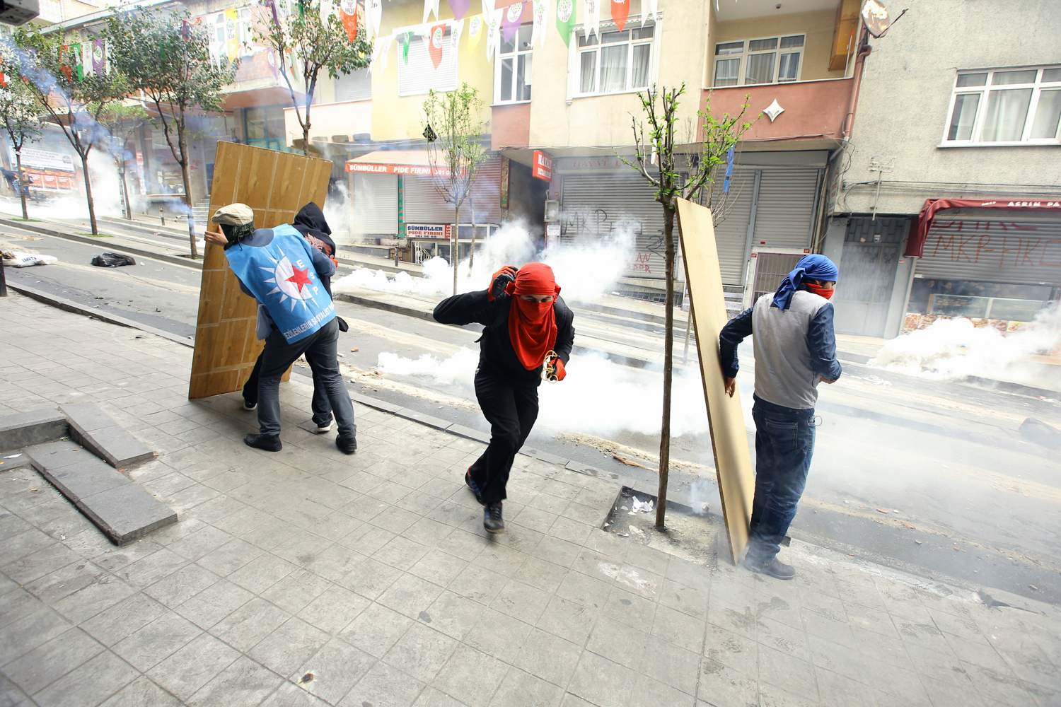 May Day Protests: Police Detain Nearly 140 People, Fire Tear Gas On ...