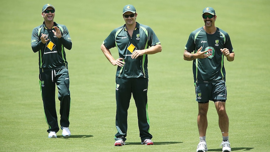 Michael Clarke, Shane Watson and Mitchell Johnson look on during a net session at Adelaide Oval.