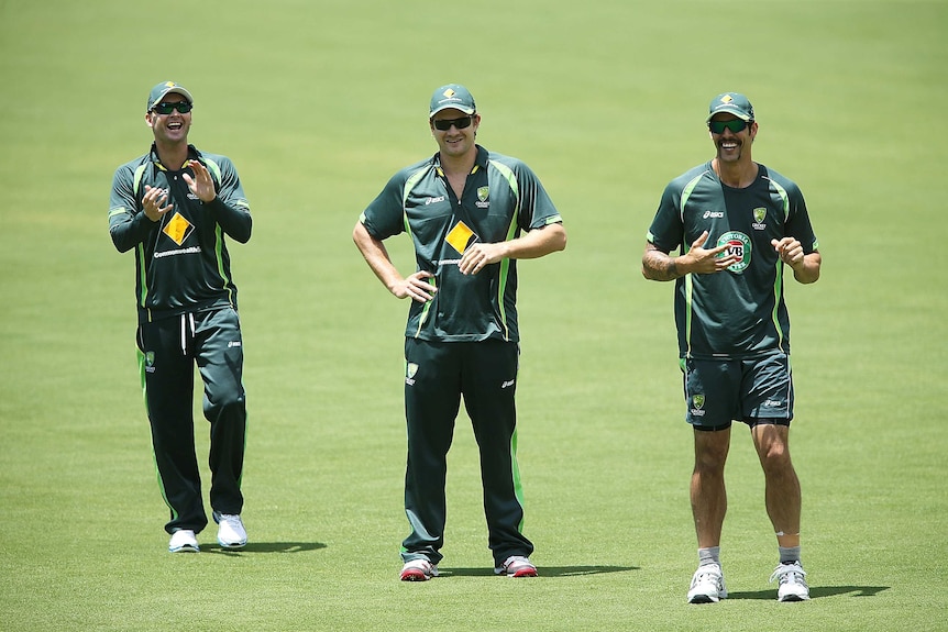 Michael Clarke, Shane Watson and Mitchell Johnson look on during a net session at Adelaide Oval.