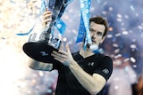 Andy Murray holds ATP World Tour Finals trophy aloft
