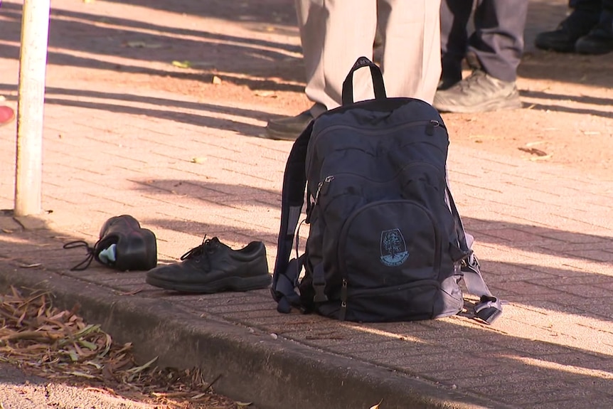 A school bag and shoes at the scene of a crash in Adelaide.