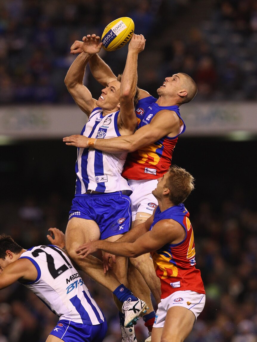 The Kangaroos' Drew Petrie had a big day against the Lions, kicking three goals and taking a number of flying marks.