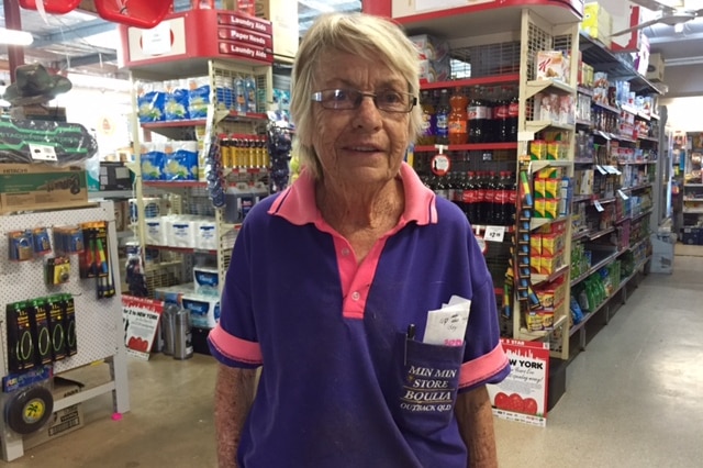 Val Spilsbury standing in the middle of her shop in Boulia which is the grocery, tyre, hardware and home ware shop.