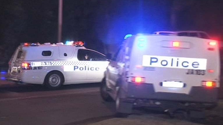 Two police cars on way to Banksia Hill detention centre.jpg