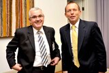 Andrew Wilkie (left) meets with Tony Abbott